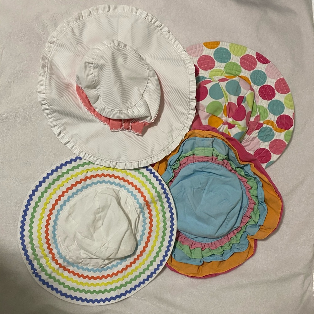 4 gently used Gymboree sun hats 0-12 months